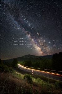 Car light streaks on US 101 beneath the annotated starry skies