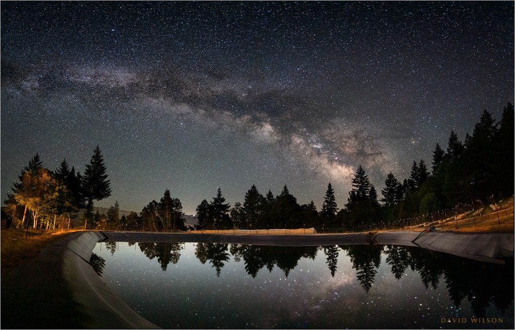 Milky Way over large catchment pond