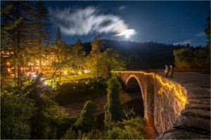 Scouting the Benbow Inn and bridge in Humboldt County, California, under moonlight on August 3, 2025, with two family members on the bridge looking across toward the Inn.